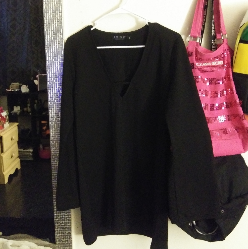 J.M.D.Z black low v cut mod dress.